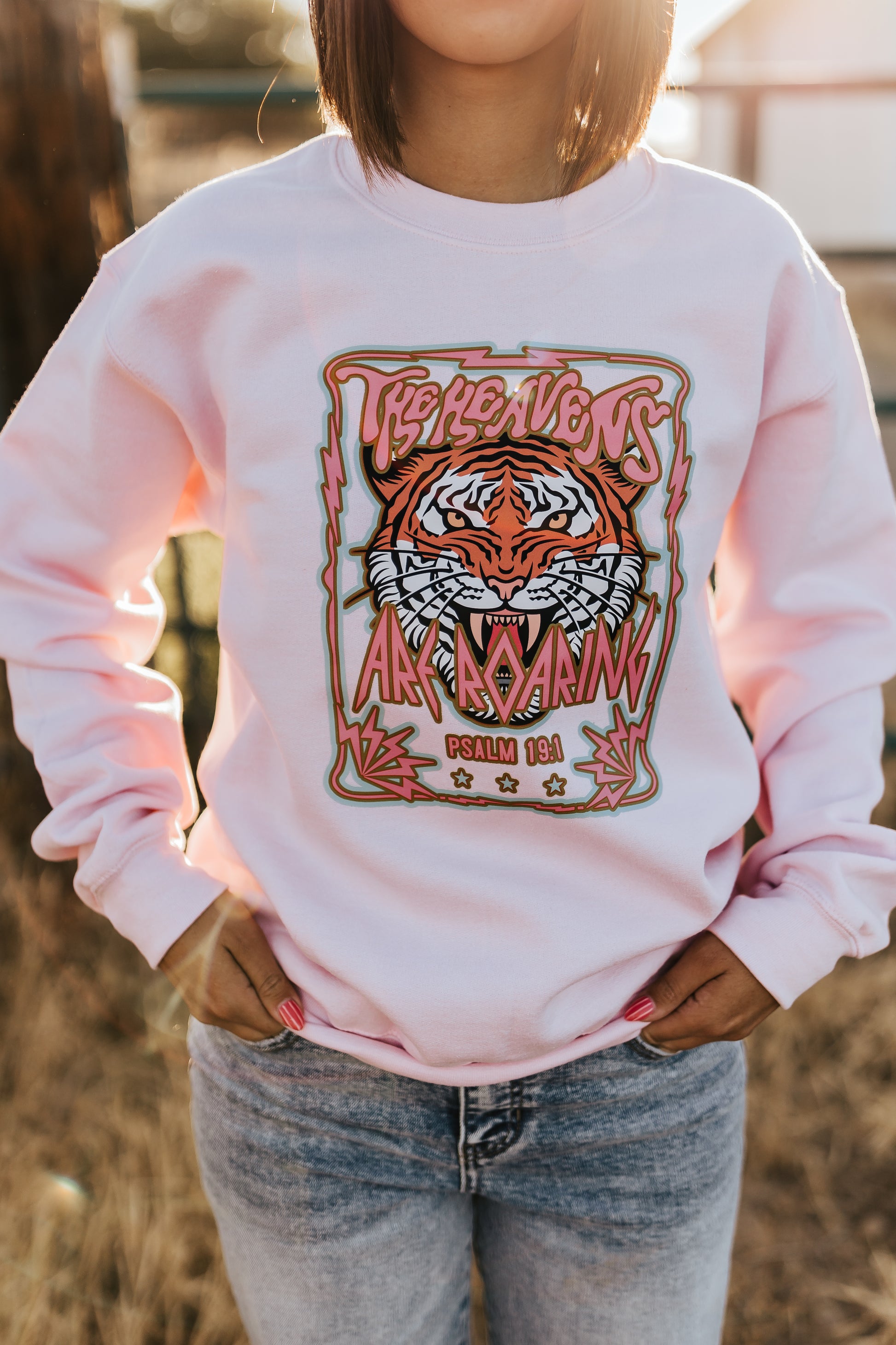THE HEAVENS ARE ROARING SWEATSHIRT