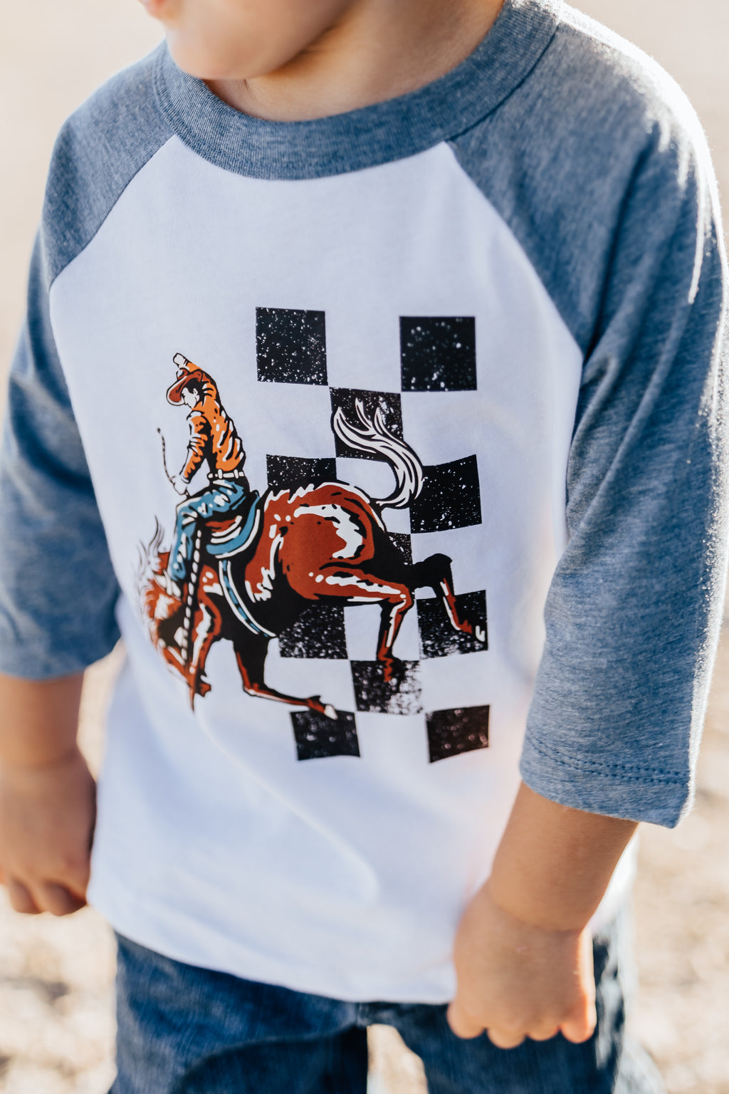 BUCKIN HORSE BASEBALL TEE