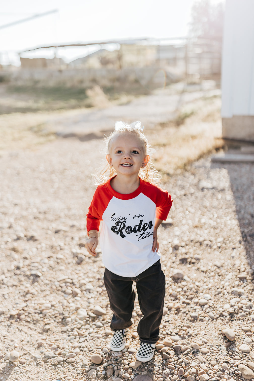 LIVIN’ ON RODEO TIME BASEBALL TEE